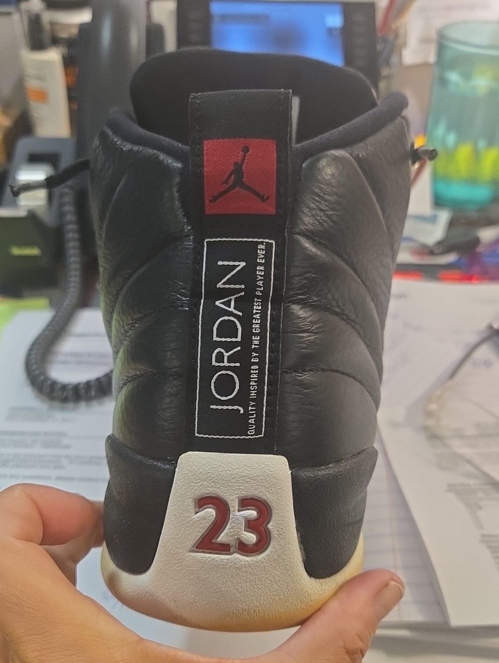 Jordan Black Leather High-Top Sneaker with Red Accents